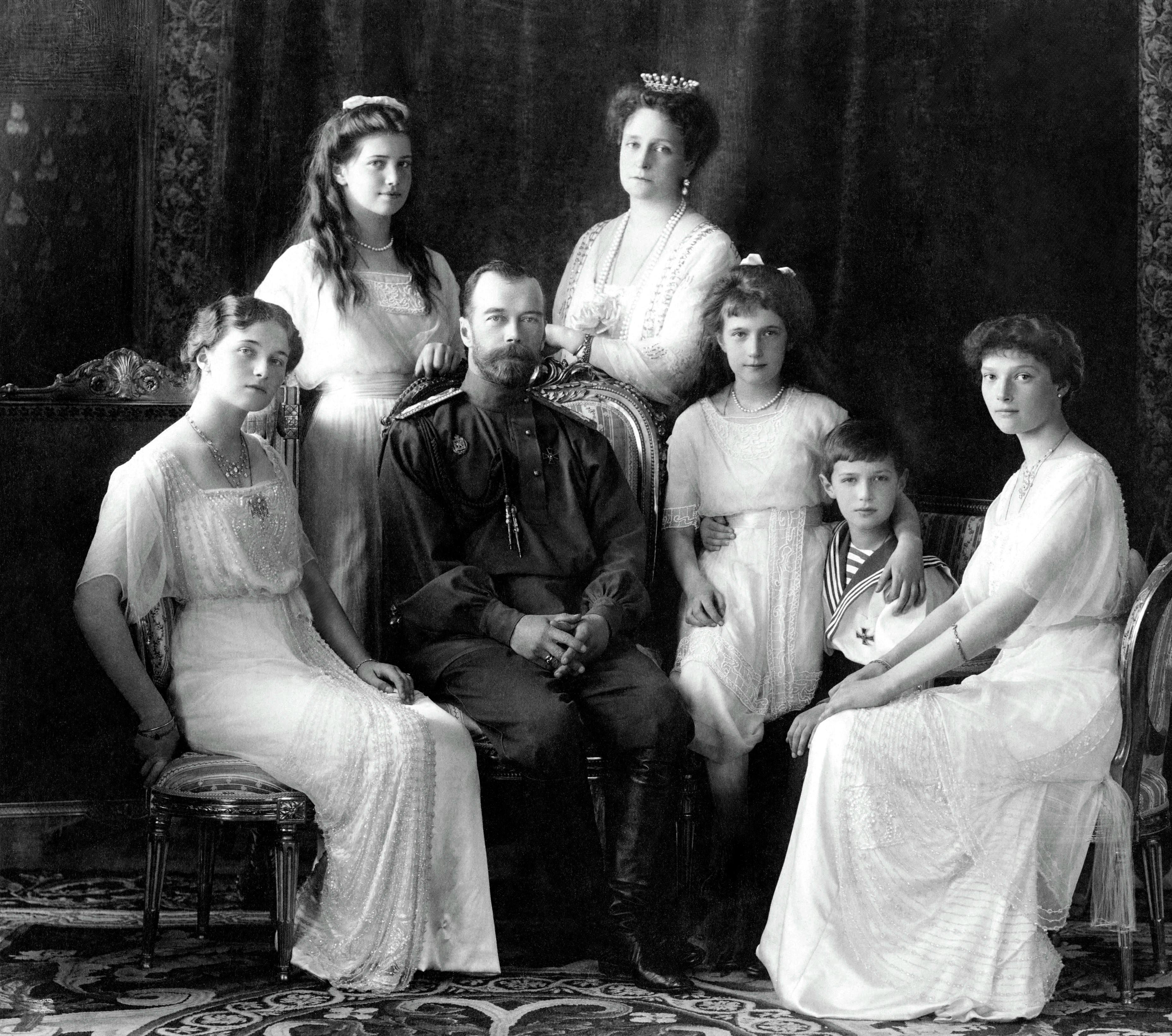 Nicholas II of Russia with the family (left to right): Olga, Maria, Nicholas II, Alexandra Fyodorovna, Anastasia, Alexei, and Tatiana. Livadiya, Crimea, 1913. Public domain via Wikimedia Commons.