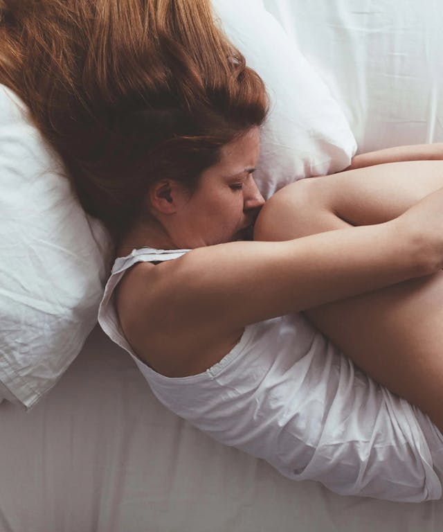 Painful Period Cramps Aren't Actually "Normal." Here's How To Fix Them