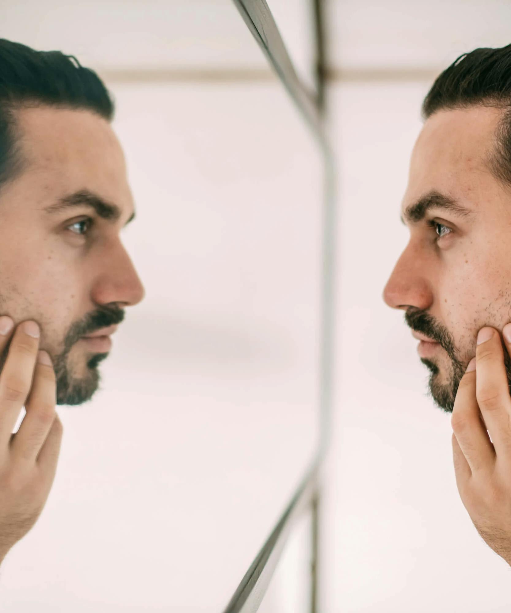 4 Signs A Man You Know Is Suffering From Body Image Issues shutterstock