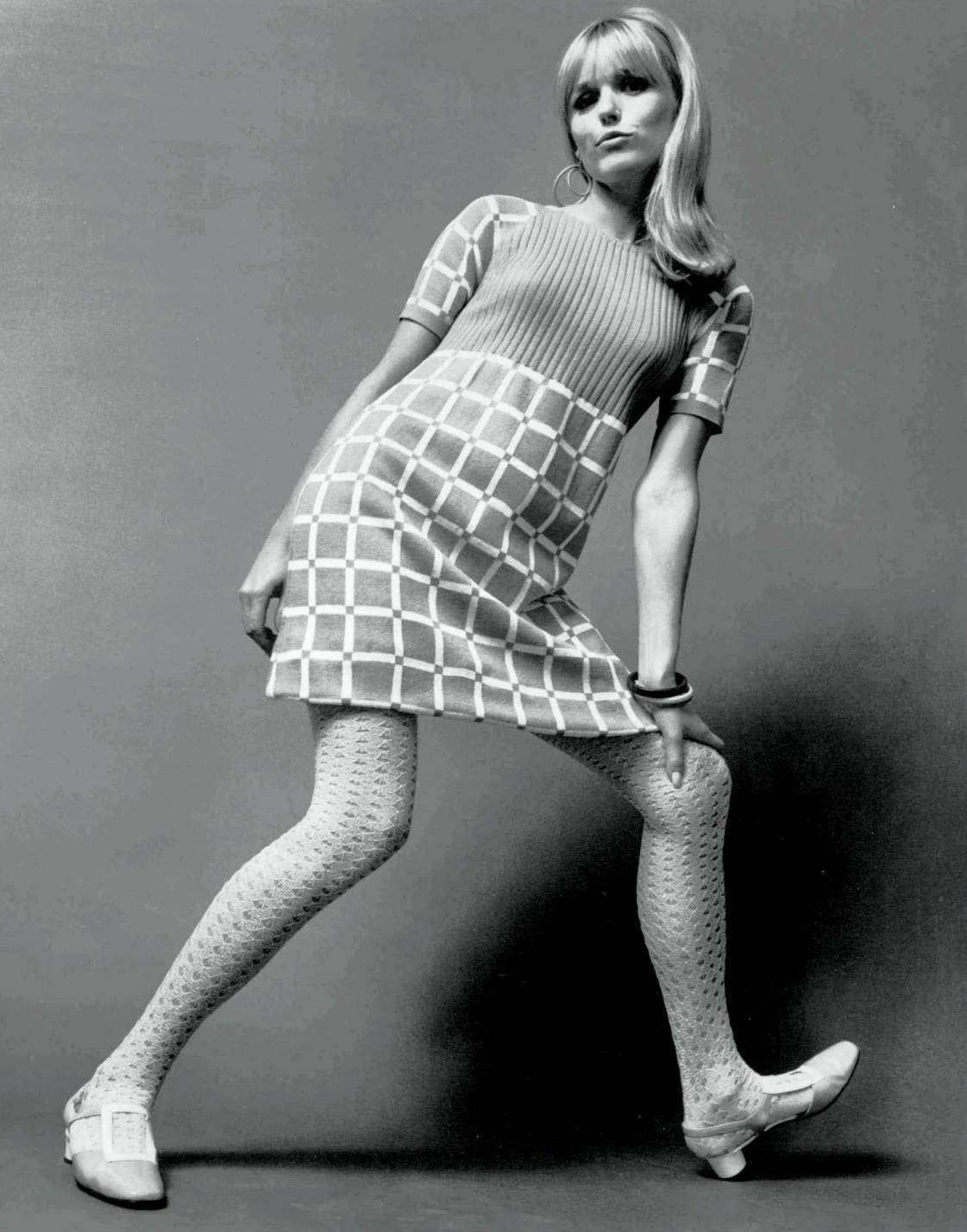 Model wearing a sweater-knit dress. 1967. Durene Association of America, New York, Public domain, via Wikimedia Commons.