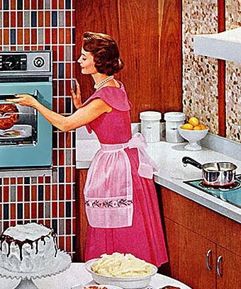 1950s housewife baking in kitchen