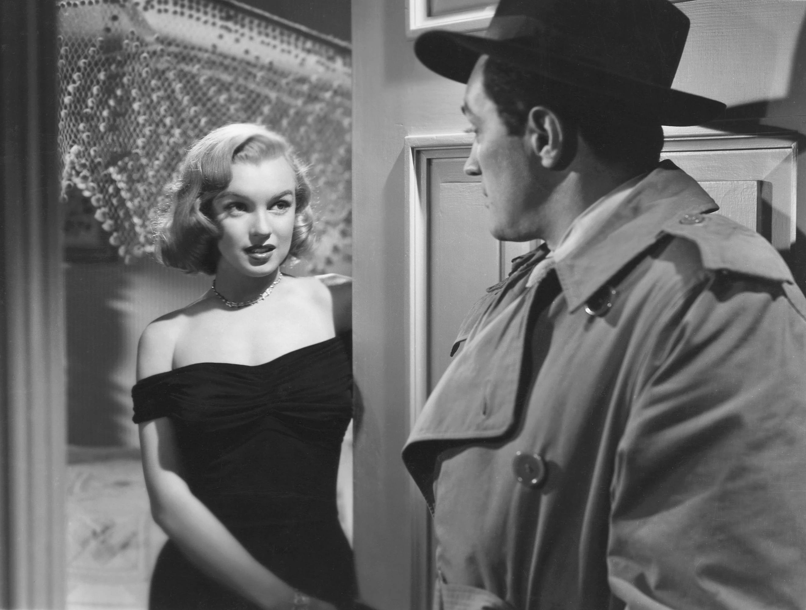 Photo of Marilyn Monroe in the Asphalt Jungle from the May 1961 issue of TV-Radio Mirror. Macfadden Publications New York. Public domain, via Wikimedia Commons.