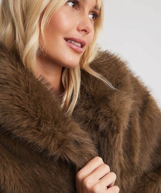 Embracing The Mob Wife Aesthetic? Here Are 25 Coats We’re Loving RN